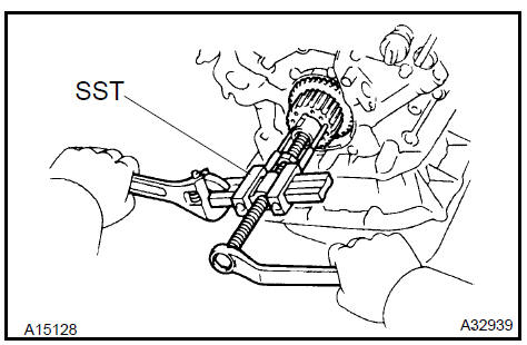 Remove crankshaft timing pulley