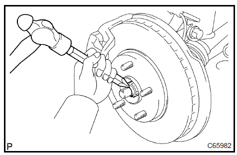 Install front axle hub LH nut