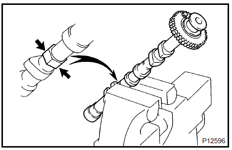 b. Using SST, turn the sub gear counterclockwise, and remove