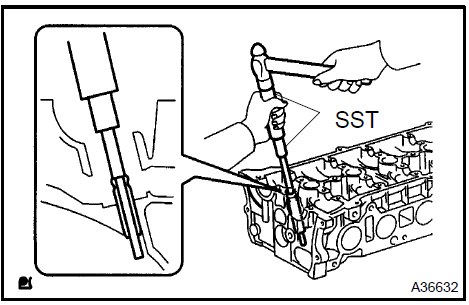 Remove intake valve guide bush