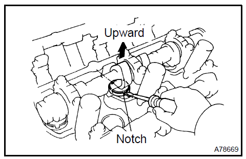 c. Using SST a., press down the valve lifter and place SST