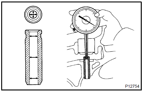 15. REMOVE VALVE GUIDE BUSHING