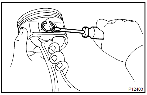  Remove piston pin hole snap ring