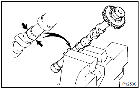 b. Using SST, turn the sub gear counterclockwise, and remove