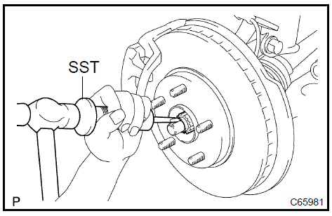  Remove front axle hub LH nut