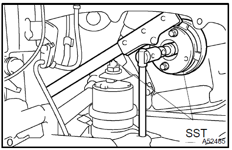 2. Using SST, remove the bolt and pulley.