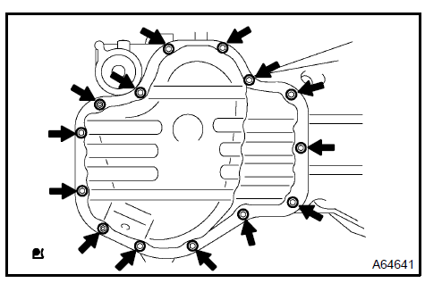 b. Insert the blade of SST between the crankcase and oil