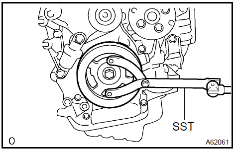 c. Remove the 8 bolts, rear spacer, drive plate and front