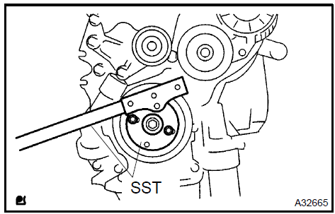 b. Remove the 8 bolts, rear spacer and flywheel.