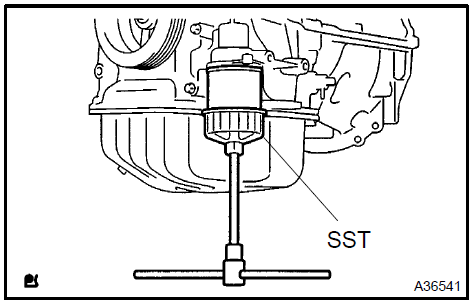 Remove oil filter sub-assy