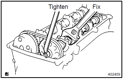 k. Check that the timing chain paint marks are aligned with