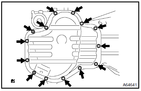 b. Insert the blade of SST between the crankcase and oil