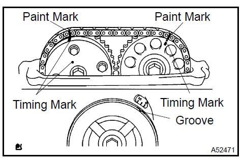 c. Remove the 2 bolts and chain tensioner.