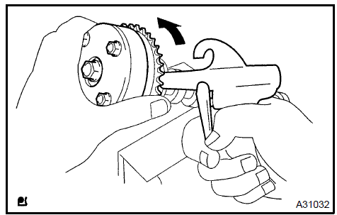 e. Remove the fringe bolt from the camshaft timing gear.